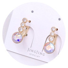 Сережки XР. Позолота 18К. Камені: Swarovski бензинового кольору та циркон. Довжина: 16 мм. Ширина: 7 мм.
