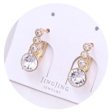 Сережки XР. Позолота 18К. Камені: Swarovski білого кольору та циркон. Довжина: 16 мм. Ширина: 7 мм.
