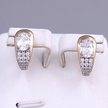Сережки ХР. Позолота 18К + родій. Камені: білий циркон. Довжина: 15 мм. Ширина: 7 мм.