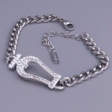 Браслет двосторонній з білою емаллю Stainless Steel. Сталь. Родій. Довжина: 18-23 см. Ширина: 15 мм.