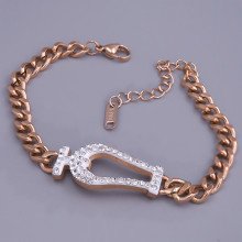 Браслет двосторонній з білою емаллю Stainless Steel. Сталь. Позолота ЧВ. Довжина: 18-23 см. Ширина: 15 мм.