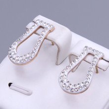Сережки-гвоздики з білою емаллю Stainless Steel. Сталь. Позолота ЧВ. Камені: циркон. Довжина: 20 мм. Ширина: 12 мм.