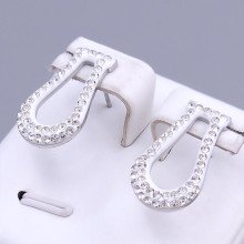 Сережки-гвоздикиз білою емаллю Stainless Steel. Сталь. Родій. Камені: білий циркон. Довжина: 20 мм. Ширина: 12 мм.