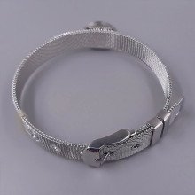 Жорсткий браслет Stainless Steel з білою емаллю. Сталь. Родій. Довжина: 21 см. Ширина: 15 мм.