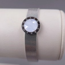 Жорсткий браслет Stainless Steel з білою емаллю. Сталь. Родій. Довжина: 21 см. Ширина: 15 мм.