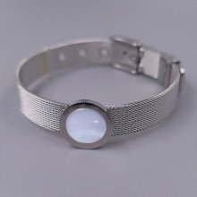 Жорсткий браслет Stainless Steel з білою емаллю. Сталь. Родій. Довжина: 21 см. Ширина: 15 мм.