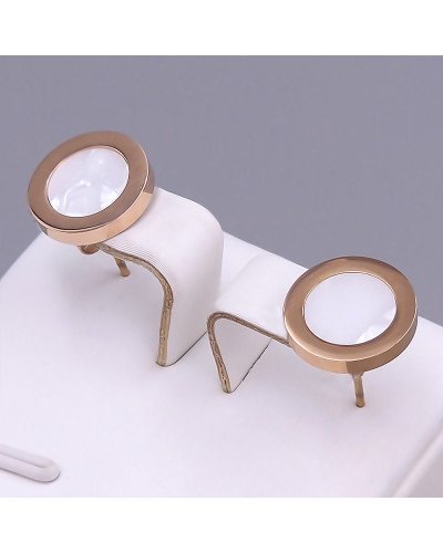 Сережки-гвоздики Stainless Steel з білою емаллю. Сталь. Позолота ЧВ. Довжина: 15 мм. Ширина: 11 мм.