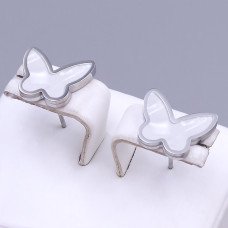 Сережки-гвоздики Stainless Steel з рожевою емаллю. Сталь. Родій. Довжина: 12 мм. Ширина: 14 мм.