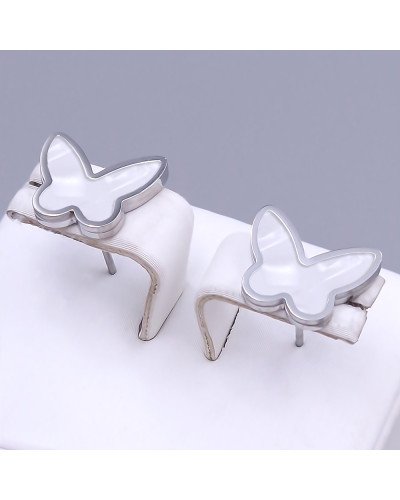 Сережки-гвоздики Stainless Steel з рожевою емаллю. Сталь. Родій. Довжина: 12 мм. Ширина: 14 мм.