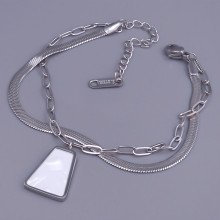Браслет Stainless Steel з білою емаллю. Сталь. Родій. Довжина: 17-22 см. Ширина: 12 мм.