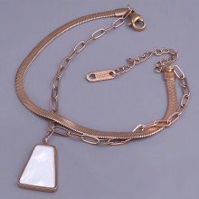 Браслет Stainless Steel з білою емаллю. Сталь. Позолота ЧВ. Довжина: 17-22 см Ширина: 12 мм.
