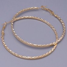 Булатні сережки-кільця з рифленням. Позолота. Довжина сережки: 6 см. Товщина: 3 мм.