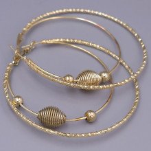 Булатні сережки-кільця з рифленням. Позолота. Довжина сережки: 6 см. Товщина: 7 мм.