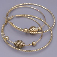 Булатні сережки-кільця з рифленням. Позолота. Довжина сережки: 6 см. Товщина: 7 мм.