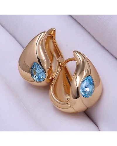 Сережки XР. Позолота 18К. Камені: Swarovski бірюзового кольору. Довжина: 16 мм. Ширина: 10 мм.