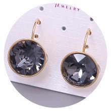 Сережки XР. Позолота 18К. Камені: Swarovski чорного кольору. Довжина: 22 мм. Ширина: 15 мм.