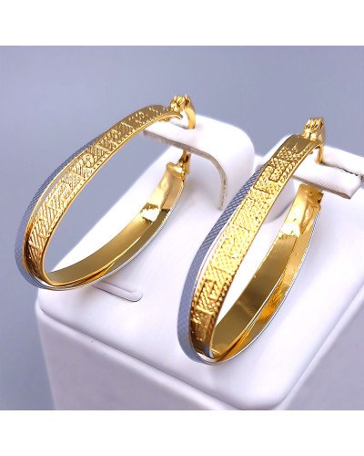 Сережки Stainless Steel. Сталь. Позолота 18К з лимонним відтінком + родій. Довжина: 40 мм. Ширина: 7 мм.