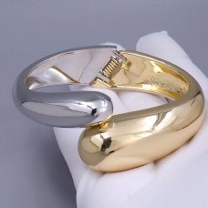 Браслет ХР. Позолота 18К + родій. Діаметр: 74 мм. Ширина: 29 мм