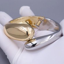 Браслет ХР. Позолота 18К + родій. Діаметр: 74 мм. Ширина: 29 мм