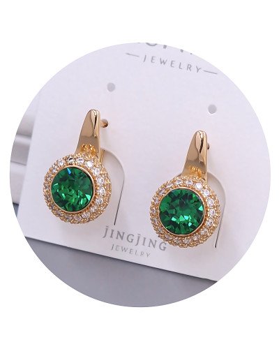 Сережки XР. Позолота 18К. Камені: Swarovski зеленого кольору та білий циркон. Довжина: 20 мм. Ширина: 12 мм.