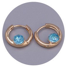 Сережки XР. Позолота 18К. Камені: Swarovski блакитного кольору. Діаметр: 15 мм. Ширина: 5 мм.