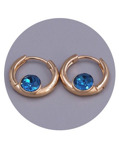 Сережки XР. Позолота 18К. Камені: Swarovski темно-блакитного кольору. Діаметр: 15 мм. Ширина: 5 мм.