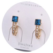 Сережки XР. Позолота 18К. Камені: Swarovski та циркон. Довжина: 16 мм. Ширина: 5 мм.