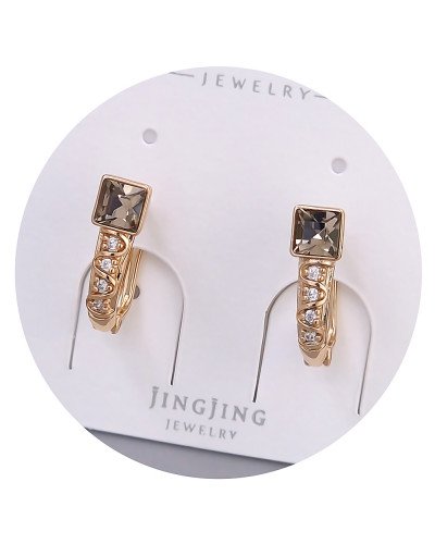 Сережки XР. Позолота 18К. Камені: Swarovski та циркон. Довжина: 16 мм. Ширина: 5 мм.