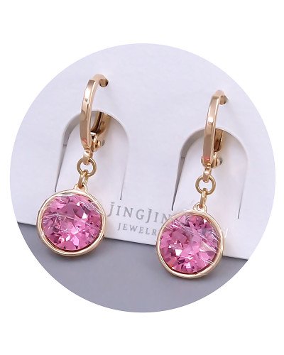 Сережки XР. Позолота 18К. Камені: Swarovski рожевого кольору. Довжина: 26 мм. Ширина: 10 мм.