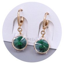 Сережки XР. Позолота 18К. Камені: Swarovski зеленого кольору. Довжина: 26 мм. Ширина: 10 мм.