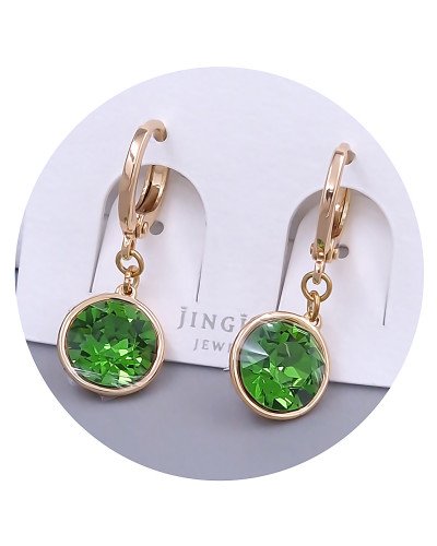 Сережки XР. Позолота 18К. Камені: Swarovski оливкового кольору. Довжина: 26 мм. Ширина: 10 мм.