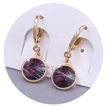 Сережки XР. Позолота 18К. Камені: Swarovski фіолетового кольору. Довжина: 26 мм. Ширина: 10 мм.