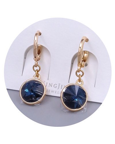 Сережки XР. Позолота 18К. Камені: Swarovski темно-синього кольору. Довжина: 26 мм. Ширина: 10 мм.
