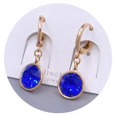 Сережки XР. Позолота 18К. Камені: Swarovski синього кольору. Довжина: 26 мм. Ширина: 10 мм.