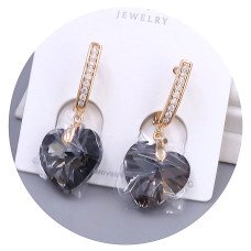 Сережки XР. Позолота 18К. Камені: Swarovski чорного кольору та білий циркон. Довжина: 34 мм. Ширина: 14 мм.