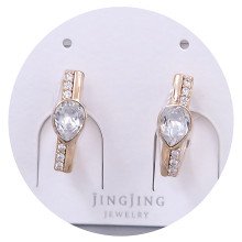 Сережки XР. Позолота 18К. Камені: Swarovski та циркон білого кольору. Довжина: 16 мм. Ширина: 5 мм.