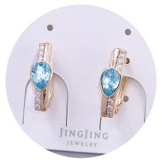 Сережки XР. Позолота 18К. Камені: Swarovski блакитного кольору та білий циркон. Довжина: 16 мм. Ширина: 5 мм.