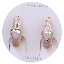 Сережки XР. Позолота 18К. Swarovski бензинового кольору та білий циркон. Довжина: 18 мм. Ширина: 6 мм.