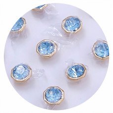 Сережки-гвоздики XР. Позолота 18К. Камені: Swarovski блакитного кольору. Діаметр: 6 мм 12 пар