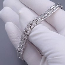 Браслет ХР. Родій. Камені: білий циркон. Довжина: 16.5-18.5 см. Ширина: 7 мм