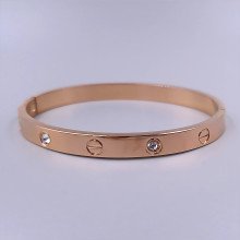 Жорсткий браслет Stainless Steel. Сталь. Позолота ЧВ. Камені: білий циркон. Діаметр: 64 мм