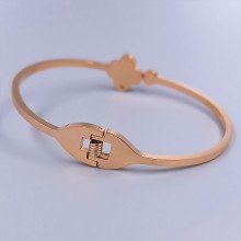 Жорсткий браслет Stainless Steel. Сталь. Позолота ЧВ. Камені: білий циркон. Діаметр: 64 мм