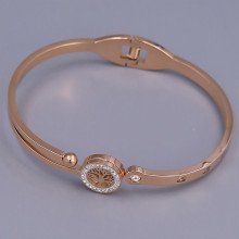 Жорсткий браслет Stainless Steel. Сталь. Позолота ЧВ. Камені: білий циркон. Діаметр: 65 мм