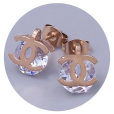 Сережки-гвоздики Stainless Steel. Сталь. Позолота ЧВ. Камені: білий циркон. Довжина: 17 мм. Ширина: 9 мм.