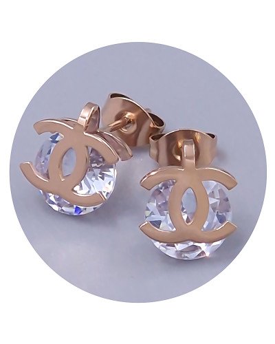 Сережки-гвоздики Stainless Steel. Сталь. Позолота ЧВ. Камені: білий циркон. Довжина: 17 мм. Ширина: 9 мм.