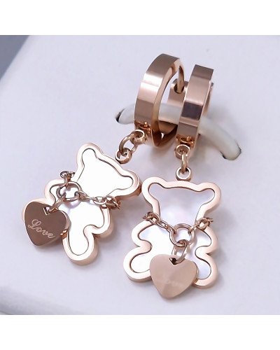 Сережки Stainless Steel з білою емаллю. Сталь. Позолота ЧВ. Довжина: 32 мм. Ширина: 13 мм.