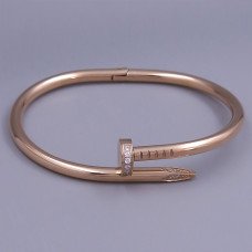 Жорсткий браслет Stainless Steel. Сталь. Позолота ЧВ. Камені: білий циркон. Діаметр: 68 мм.