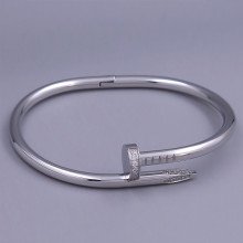 Жорсткий браслет Stainless Steel. Сталь. Родій. Камені: білий циркон. Діаметр: 68 мм