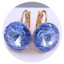 Сережки XР. Позолота 18К. Камені: Swarovski блакитного кольору. Довжина: 18 мм. Ширина: 14 мм.