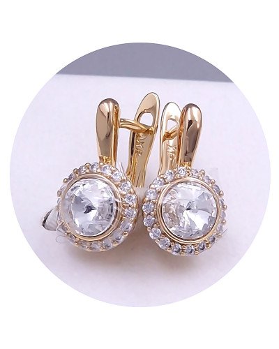 Сережки XР. Позолота 18К. Камені: Swarovski білого кольору та циркон. Довжина: 16 мм. Ширина: 9 мм.
